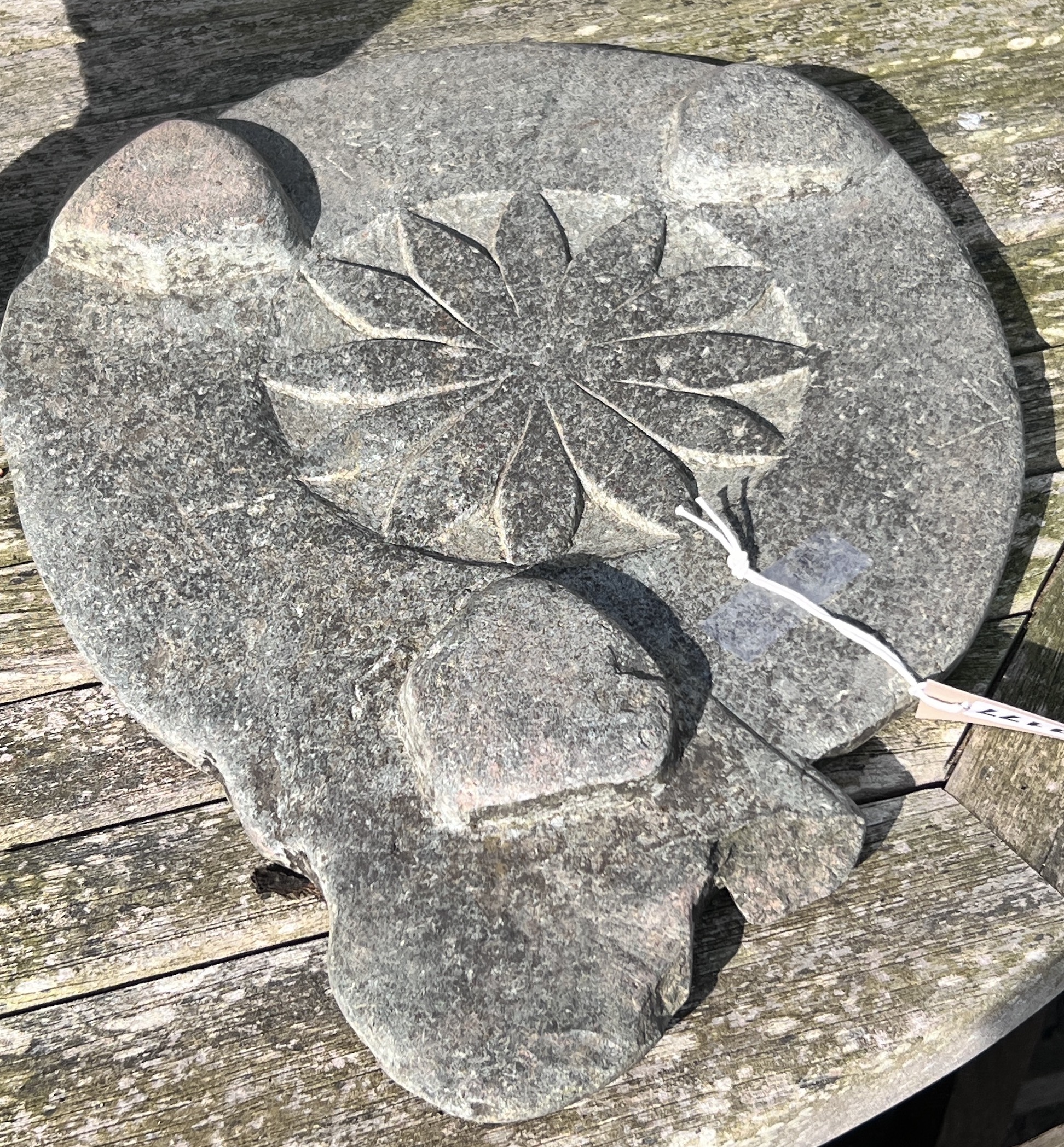 A 19th century Indian slate platter, width 31cm, height 43cm